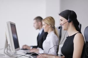 business people group with  headphones giving support in  help desk office to customers, manager giving training and education instructions